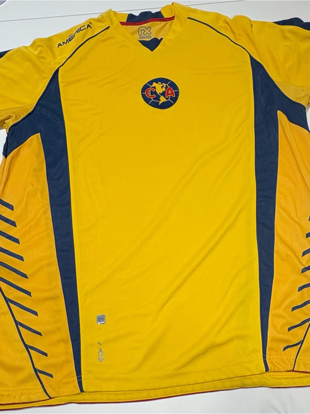 Rhinox Yellow and Navy Men's Soccer Jersey with Club Crest